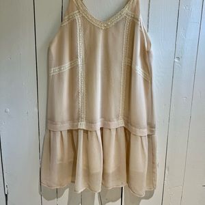 Cute blush pink lace dress with ruffled bottom